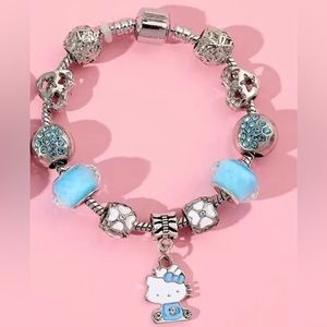 **Sanrio licensed** hello Kitty stainless steel charm bracelet NWT !